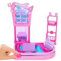 Barbie Malibu-dukke med koffert og bagasjekarusell