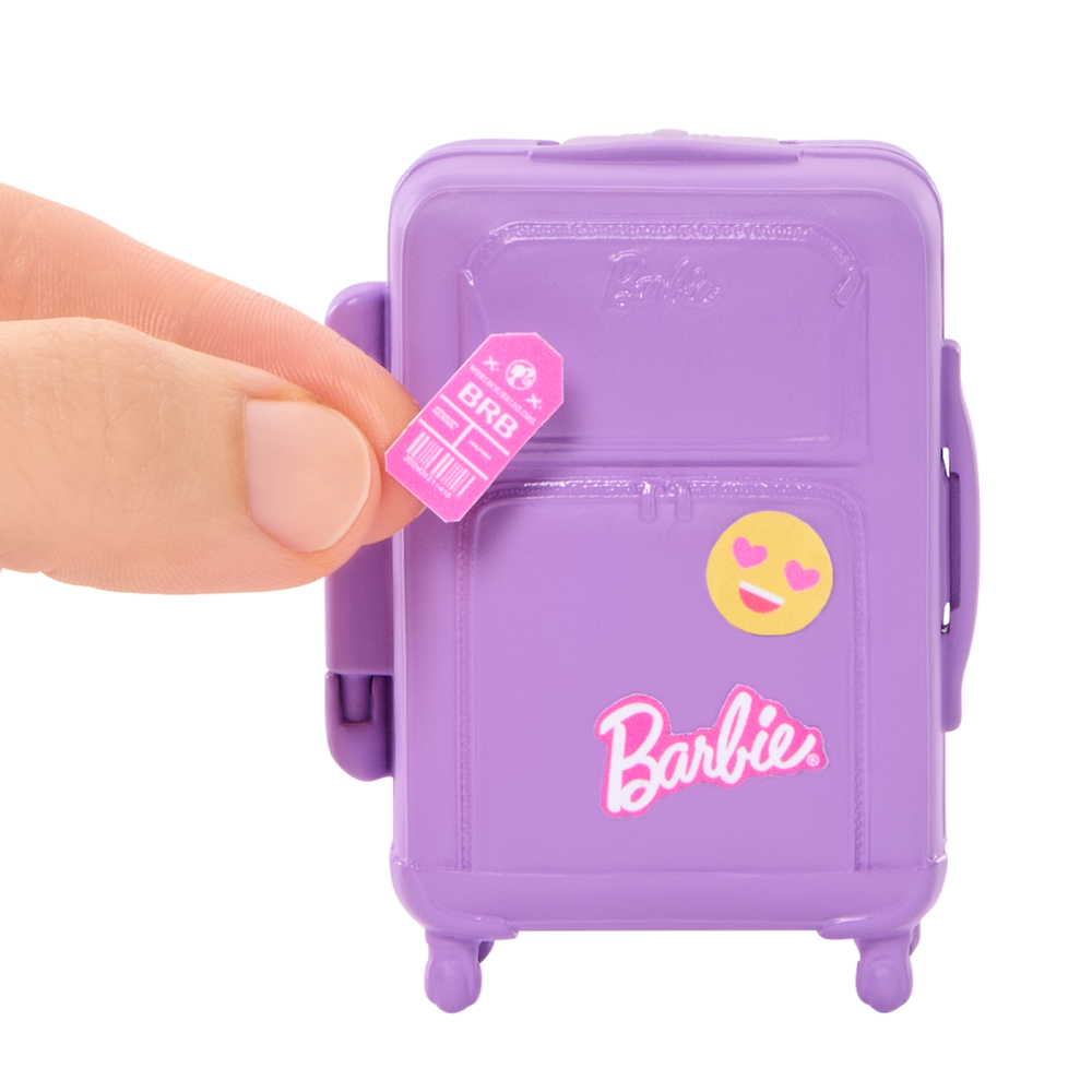 Barbie Malibu-dukke med koffert og bagasjekarusell