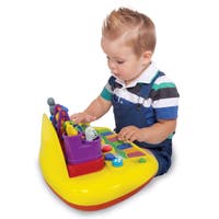KID, piano med dansende figurer